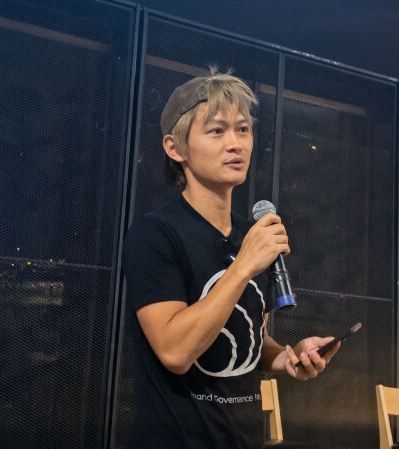 Sim Kwang Wei speaking at inaugural Cosmos Bangkok event at ZillaSpace